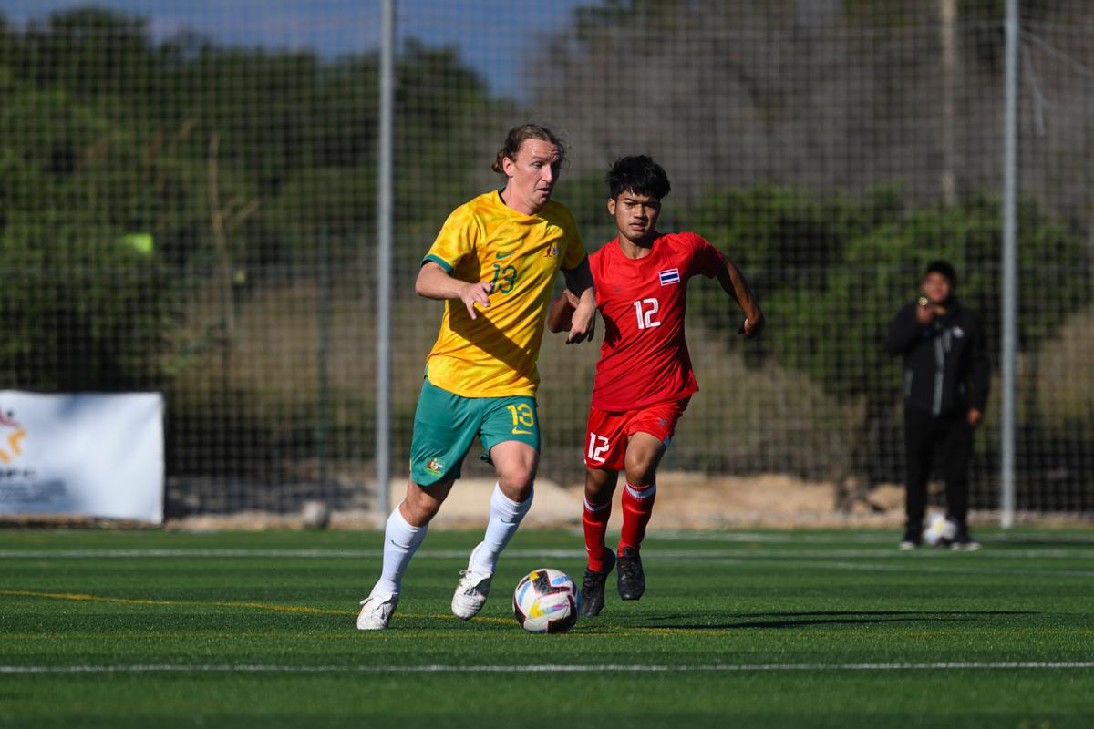 Taj Lynch looks for space. Photo Mark Avellino/Football Australia