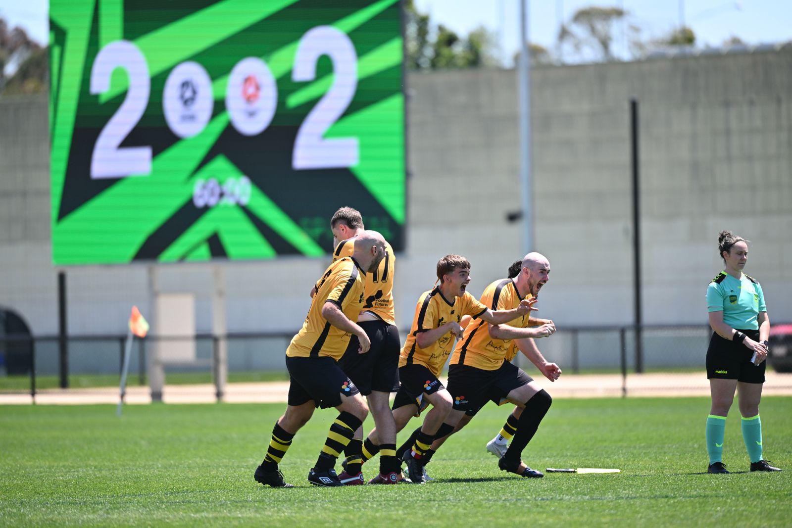 That winning feeling. Football West explode with joy as they win the National Para Football Championships.