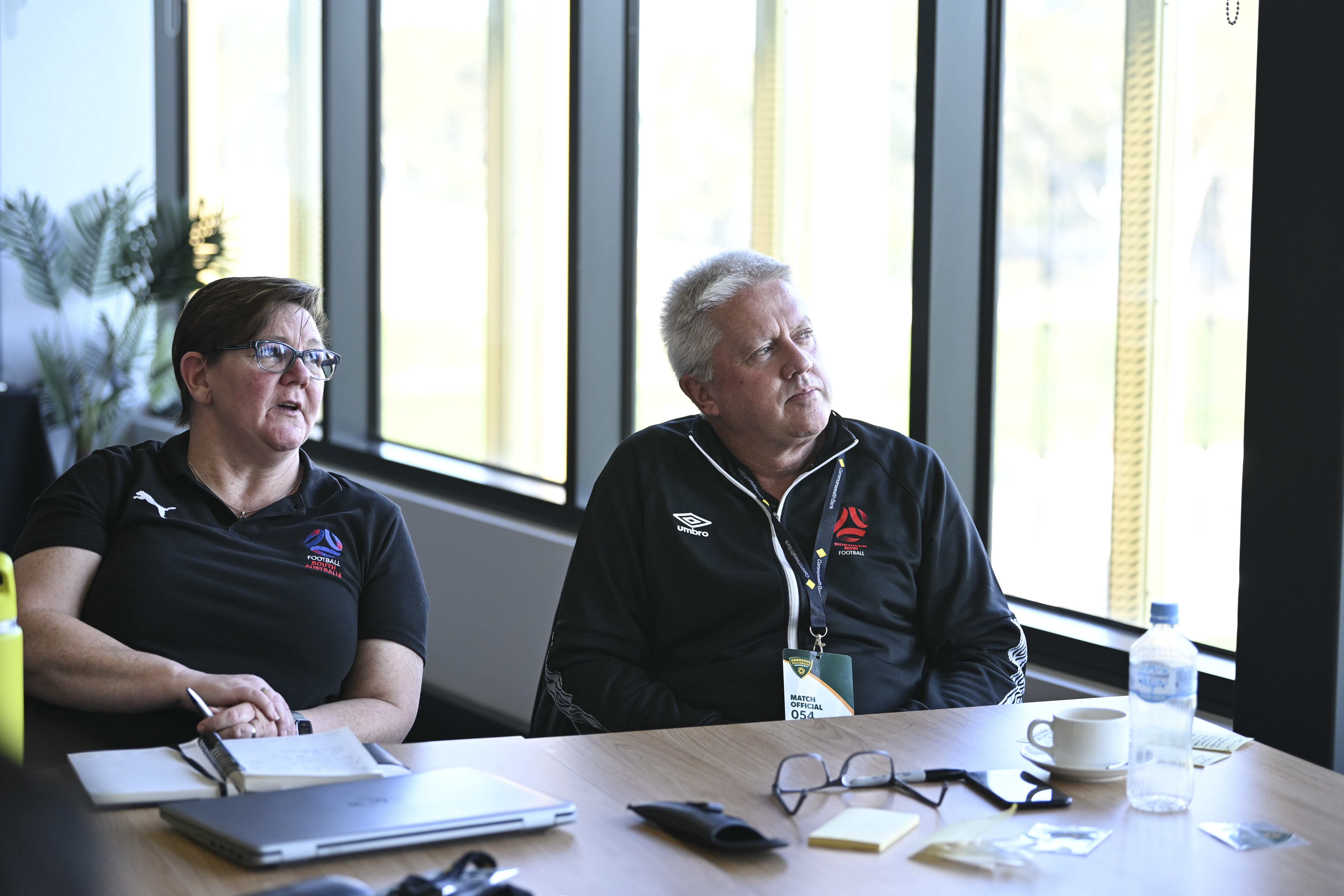 General Manager for Referee Growth and Development at Northern NSW Football, Brad Carlin listens in