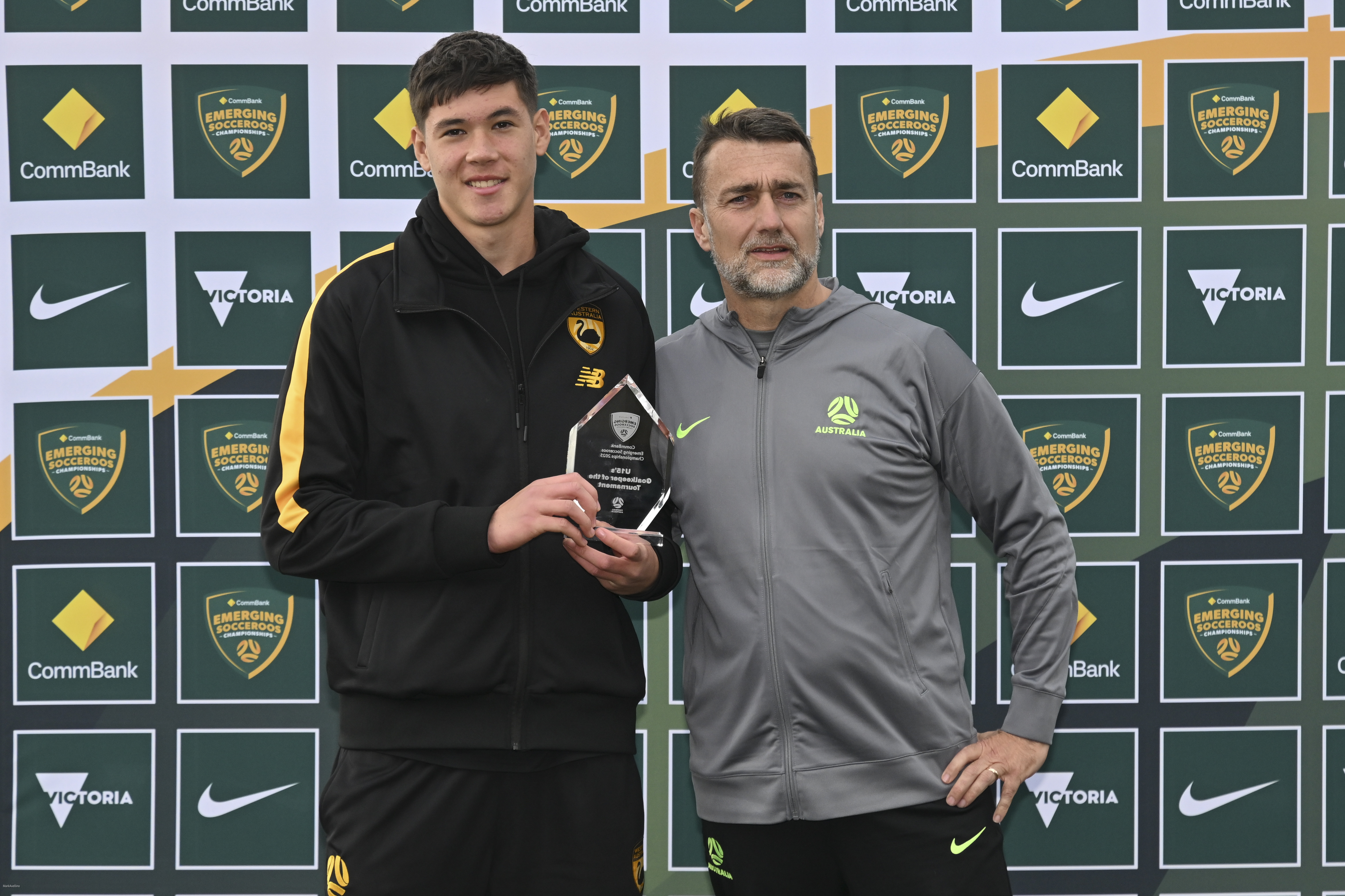 Aaron Black (Western Australia) receives the Under 15 Goalkeeper of the Tournament award from Subway Olyroos Goalkeeper Coach, Neil Tate. Photo Mark Avellino/Football Australia