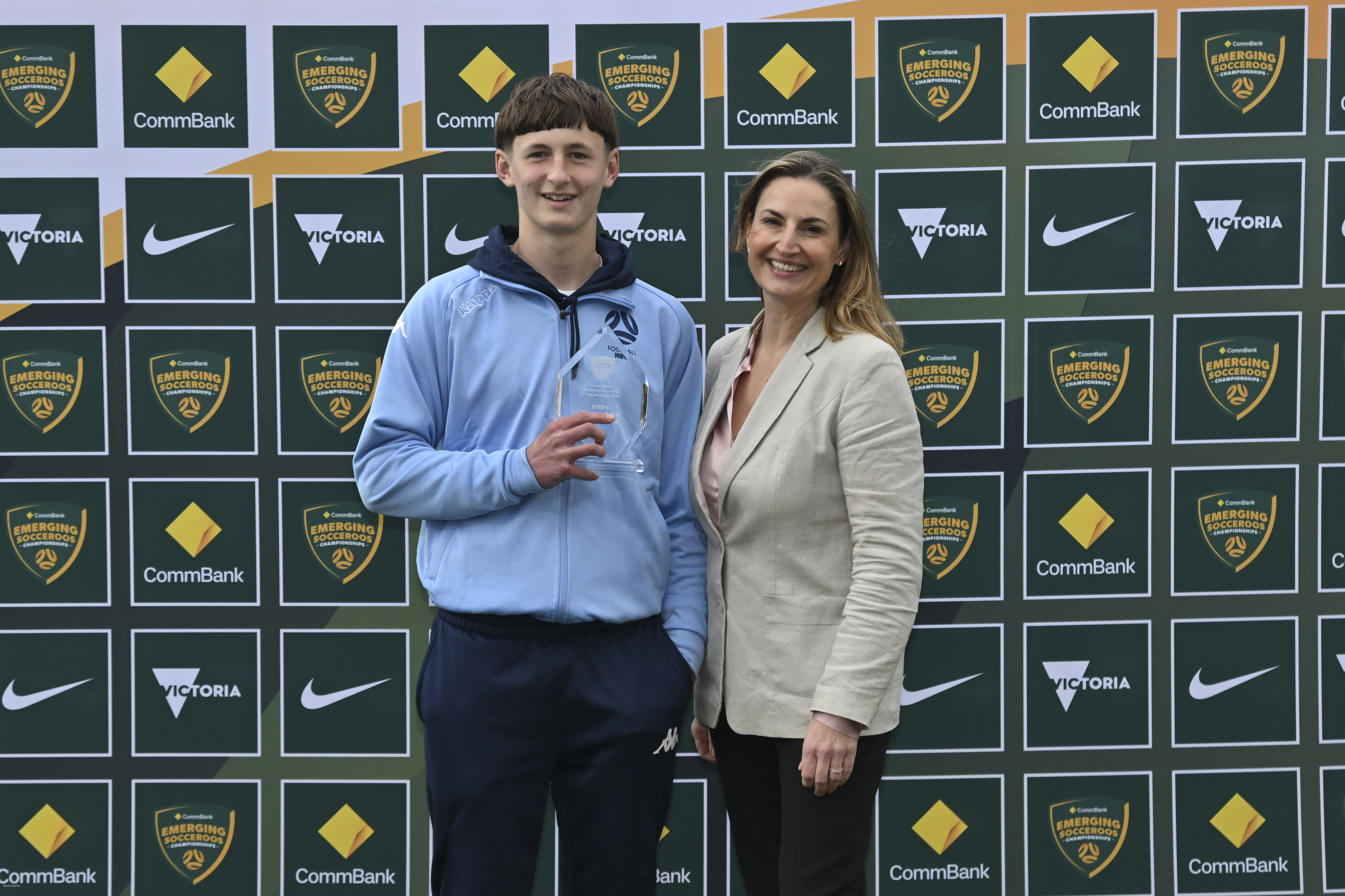 CommBank Executive Manager of Brand Partnerships, Tasmine Heath, presents the Under 16 CommBank Player of the Tournament award to Josef Sikora (Football NSW Sky). Photo Mark Avellino/Football Australia