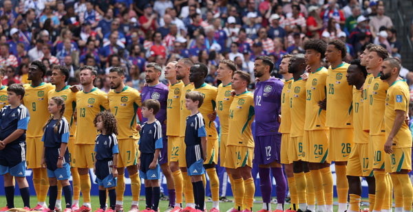 SEATTLE, WASHINGTON - JUNE 19: Players of Australia line up for the national anthem before the FIFA World Cup 2026 Group D match between USA and Australia at Seattle Stadium on June 19, 2026 in Seattle, Washington. (Photo by Sarah Stier - FIFA/FIFA via Getty Images)