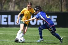 Annmarie De Uriarte of the ParaMatildas is challenged for the ball by Saki Kuroki of Japan.