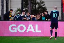 Kaylan van Heer celebrates with fans after scoring for the CommBank Pararoos. 