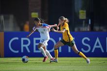 Sian Dewey of the Junior Matildas contests for the ball against Thailand at the AFC U17 Women's Asian Cup. Photo: Vachira Kalong